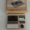 Polyend Tracker Workstation Silver with deck saver and carry case.