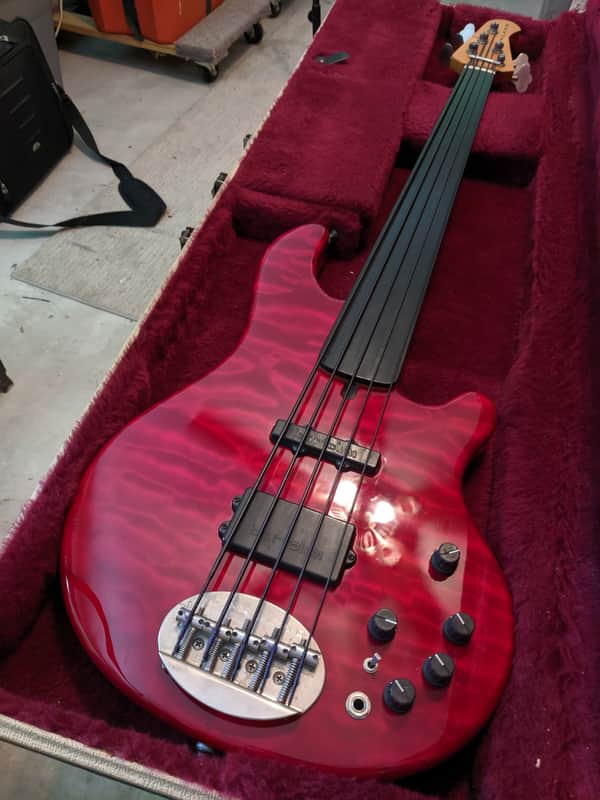 Lakland 55-94 Deluxe, fretless 34" scale, 1996 Red Quilted with case image 1