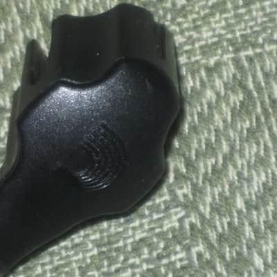 new (no package) very near A+ D'Addario Planet Waves PRO-WINDER Black String Winder & Cutter & Bridge Pin Puller DP0002 for guitar, mandolin, ukulele & banjos (black hard plastic with hardened steel wire cutters) just has few minor natural imperfections image 3