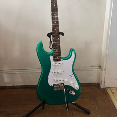 Custom Built 2026 guitar, Mahogany Body, Maple neck with laurel fingerboard. Metallic green body. Pro setup done play's great. Upgraded locking tuners, Matching Bridge image 1