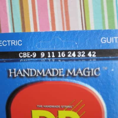 ONE SET new in packaging (old stock) DR CBE-9 (9-42) COOL BLUE electric guitar strings (9, 11, 16, 24,32, 42) "The High Performance Coating" Blue coated electric guitar strings on a hexagonal core + 2 extra gauge 9 strings (1 Elixir & 1 D'Addario) image 5