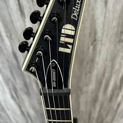 ESP LTD MH-1000 Evertune with Ebony Fretboard 2017 - Present - See Thru Black image 5