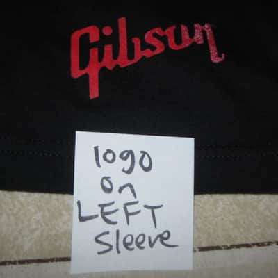 lightly worn genuine Gibson Firebird T-Shirt XL (X-Large), Black with Red Graphic, 60% Cotton / 40% Polyester - short sleeve GIBS-GA-FBBMXL (GA-FBBMXL) UPC # 711106533919, part of back neck area & right shoulder were re-stitched image 5