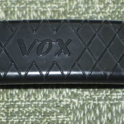 lite use (one mounting piece is broken) genuine Vox Black Plastic Dogbone Style Guitar Amplifier Handle with VOX logo and Diamond Pattern [Black hard - but flexible Plastic /  Metal Nickel mounting pieces (1 mounting piece is broken) + screws (from 2000) image 2