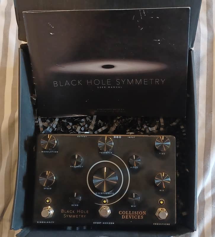 Collision Devices Black Hole Symmetry