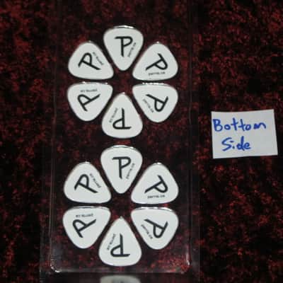 new in package (old stock) A+ Perri's Leather Ltd. / Perri's 12 Pack Of Pink Floyd Guitar Picks - Med Gauge - Celluloid Plastic, 351 shape - but slightly curved (LP12-PF1) LP12PF1 image 6