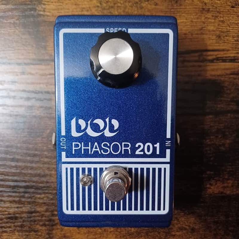Blue electronic device with "Phasor/201" label and knobs.