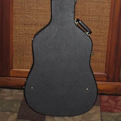 used genuine Gibson Dreadnought Hardshell Case from 2000s - Black Tolex Exterior, Wood Construction, Blue Plush Padded Interior, Gold Colored Hardware, lid has Gibson Acoustic Logo, fits square / round shoulder & cutaway dreadnought (NO guitar included) image 2