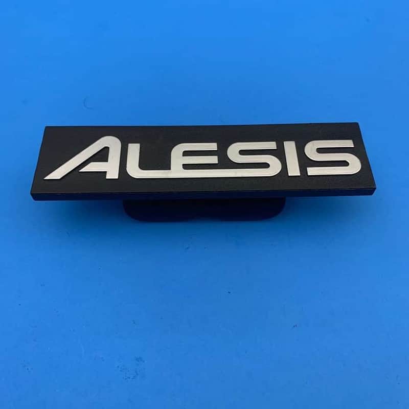 ALESIS SURGE DM6 DM7X FORGE Drum Used Part: 1/2 Inch Frame Logo Emblem Sign image 1