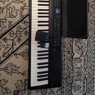 Artesia PE-88 with original pedal and charger