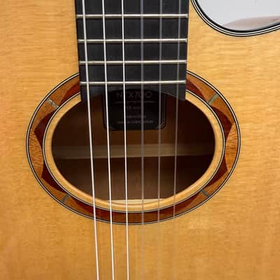 Used Yamaha NTX700 Solid Spruce Top Classical Acoustic-Electric Classical Guitar Natural image 8