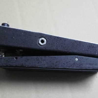 used vintage 1970s (Ser # 1972574) Thomas Organ Cry-Baby Wah, model 95-910511, has orig TDK 5103, + battery (pot is NOT scratchy, works fine) battery clip was repaired, original foam padding for battery compartment area replaced, + extra rubber feet image 11