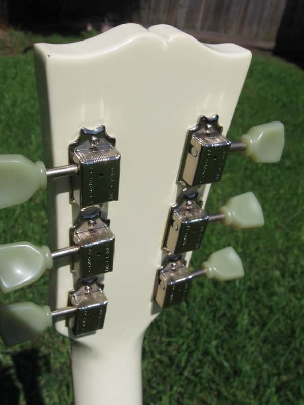 White MIJ Photogenic SG with Gibson deluxe tuners and open book