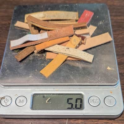 Scoop of Assorted Used Leather Accordion Reed Valves - Unit Weight 5 Grams