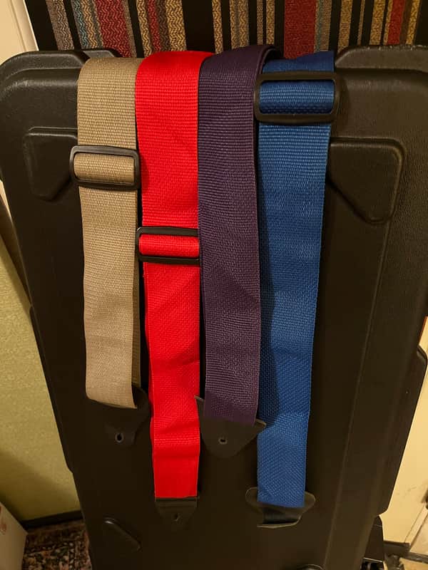 Four colorful guitar straps purple, red, blue image 1