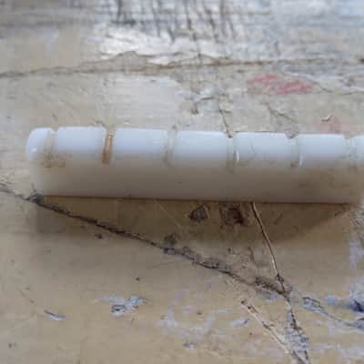 Unbranded Plastic Guitar Nut 1960s - White image 1