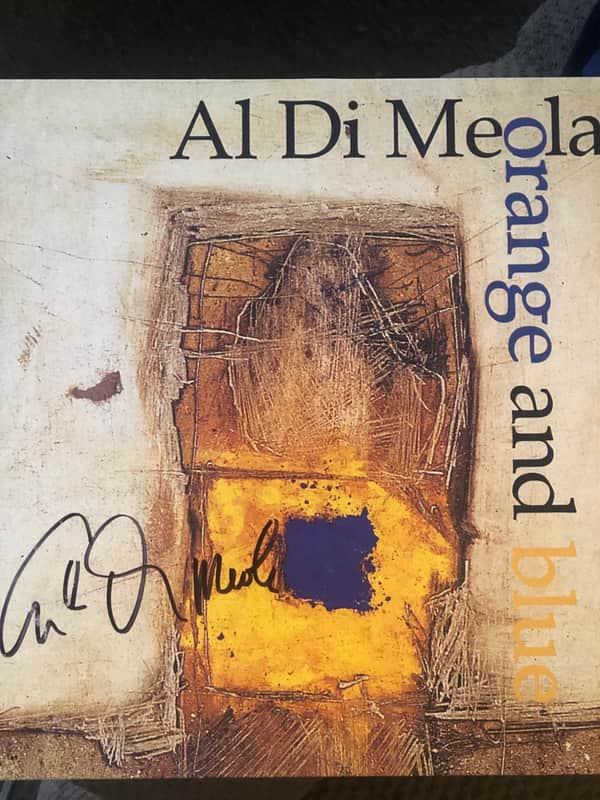 Al Di Meola Orange and blue signed vinyl image 1