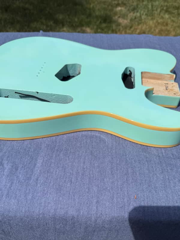 Non-branded product T-Style body 2021-2024 - Clear urethane over daphne blue. image 1