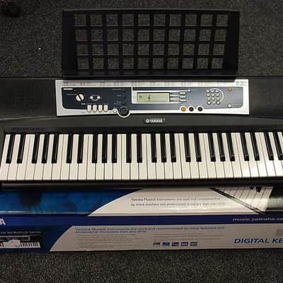 YAMAHA YPT-210 PORTABLE KEYBOARD, Inc: Box, Manual and Music Rest (SN:WBQO06767) image 1