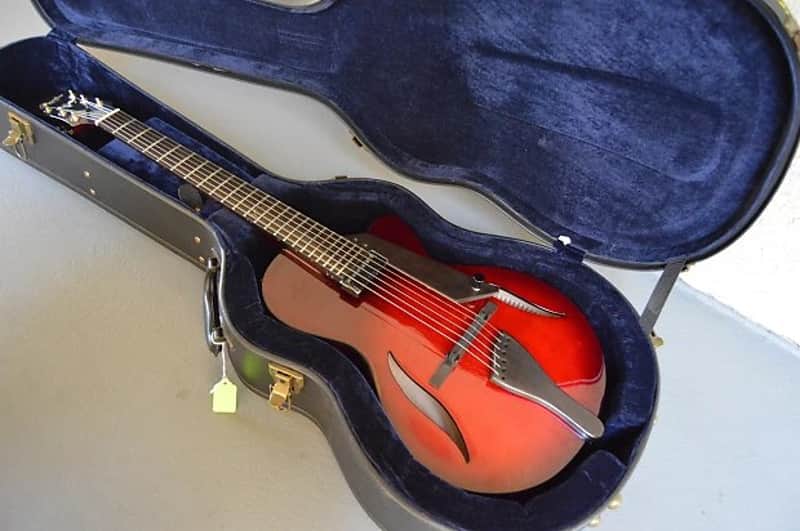 2017 Peerless 12" Serena carved spruce archtop, light travel/ parlor size guitar. Ruby Sunburst, image 1