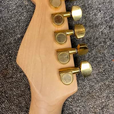Squier Pro Tone Stratocaster with Rosewood Fretboard in Crimson Red Transparent 1997 image 9