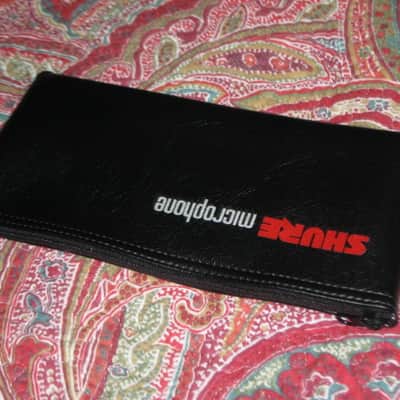 lightly used very clean 1980s Shure microphone pouch, outer areas are black vinyl with a very light reptile texture/appearance & one area has a red & silver graphic / inside is black / black zipper (NO microphone) 10 inches W, 4 & 1/2 inches H image 14