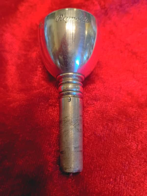 Reynolds 9 trombone mouthpiece. Interesting design. Good playing condition.