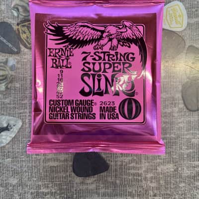 Ernie Ball Super Slinky Nickel Wound 7-String Electric Guitar Strings 9-52 Gauge image 1