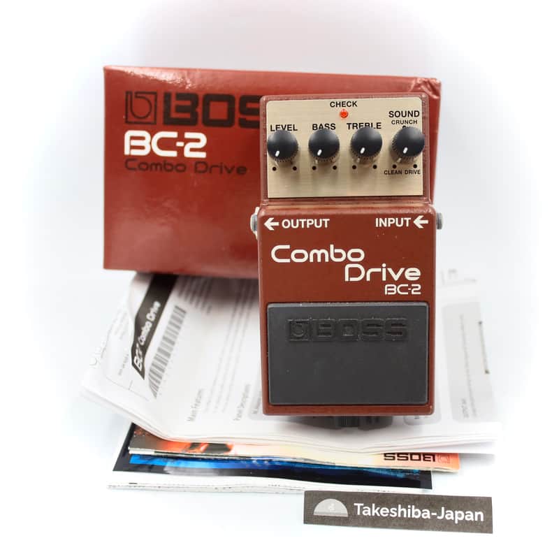 Red Boss Combo Drive BC2 guitar effects pedal with knobs.