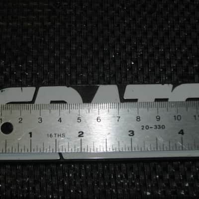 used - some imperfections genuine Crate bass amp Crate LOGO Plate (badge)- hard plastic - with 2 original screws (from a BX15 or BX25 bass amp - NO bass amp included) 1990s - early 2000s - Hard Plastic, white & black image 5