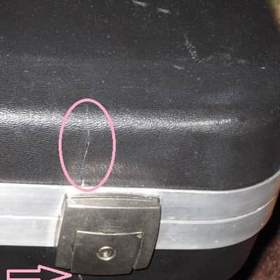 used Rickenbacker Hardshell Case for Model 620 electric guitar (NO guitar) from 1995, 2 Ball feet broke off (2 holes in plastic), Exterior plastic has some cracks,  EXT: Black Hard Plastic / Chrome HW / Handle: Black Molded Hard Plastic / INT: Blue Plush image 17