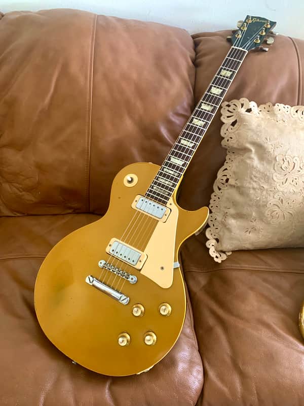 Vintage 1971 Gibson Les Paul Deluxe Goldtop - Rare Dark Back - Embossed Gibson Pickup Covers - Wonderful Condition With No Breaks Or Repairs - Vintage Patent Pending Gold Grover Tuners Installed - 9.4 LBS - Original Purple Lined Case image 1