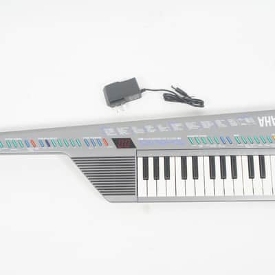 Buy used [SALE Ends Dec 25] YAMAHA SHS-10 Silver FM Synthesizer Keyboard SHS10 Shoulder Keyboard Keytar w/ 100-240V PSU