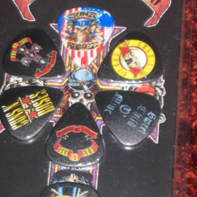 new in package (old stock) A+ Perri's Leather Ltd. / Perri's 12 Pack Of Guns N Roses Guitar Picks - Med Gauge - Celluloid Plastic, 351 shape - but slightly curved (LP12-GNR1) LP12GNR1 image 3