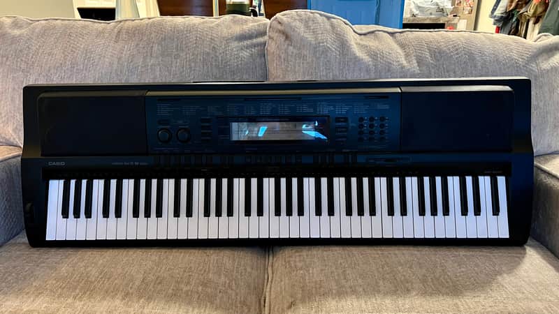 Casio WK-500 with adapter | Reverb
