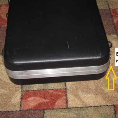 used Rickenbacker Hardshell Case for Model 620 electric guitar (NO guitar) from 1995, 2 Ball feet broke off (2 holes in plastic), Exterior plastic has some cracks,  EXT: Black Hard Plastic / Chrome HW / Handle: Black Molded Hard Plastic / INT: Blue Plush image 23