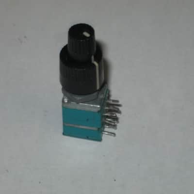 used (is fine & works) Boss MIDDLE / MID FREQ potentiometer [ upper part : 50 30C 04 5F / lower part: 10 4w 04 5F ] + nut and two piece knob (controls) taken off of MT-2 Metal Zone (pedal NOT included) 2000s / 2010 (teal rectangle shape, stacked) image 2