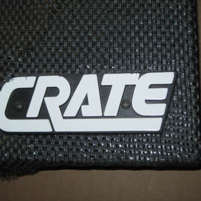 used - some imperfections genuine Crate bass amp Crate LOGO Plate (badge)- hard plastic - with 2 original screws (from a BX15 or BX25 bass amp - NO bass amp included) 1990s - early 2000s - Hard Plastic, white & black image 2