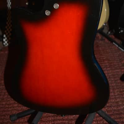 c. 1966 Vintage Harmony Holiday Bobcat, in Redburst w/DeArmond Gold foil PU's. New Black Dunlop Straplocks & New tuners installed, Fret markers installed, Ground installed & Set-Up, plus New Garry Black Hardshell Case image 5
