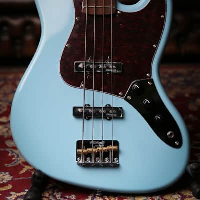 Vintage VJ74 Reissued Bass Laguna Blue Matching Colour Headstock image 1