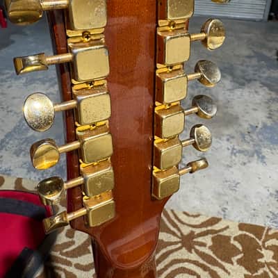 Eko Vintage Eko El Dorado 12 (top model) Spruce/Brazilian rosewood + Vox Case 1979 - Vintage 1979 Eko El Dorado 12 (top model) Spruce/Brazilian rosewood + Vox Case. It has some scratches and nicks image 4
