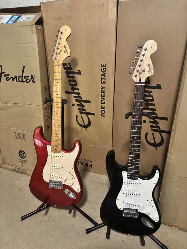 Fender Squier Affinity 'Strat' Stratocaster Black AND a Fender Squier Affinity 'Strat' Stratocaster, 2008 Candy Apple Red with a Maple neck image 1
