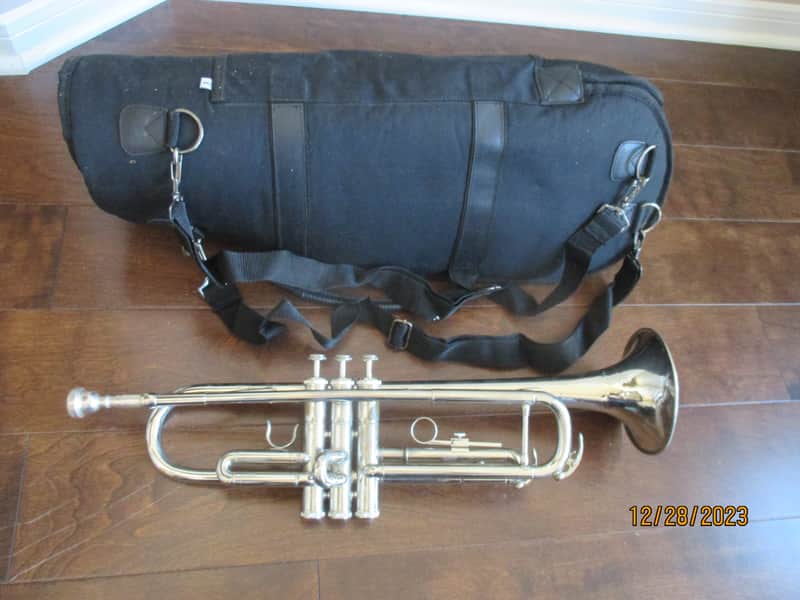 Conductor brand trumpet with case and mouthpiece.  Silver image 1