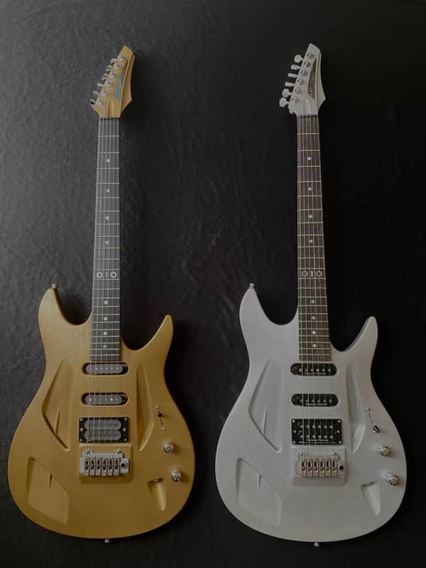 Aristides 010 arium gold collectible pair European boutique custom guitar super strat aluminum worldwide shipping