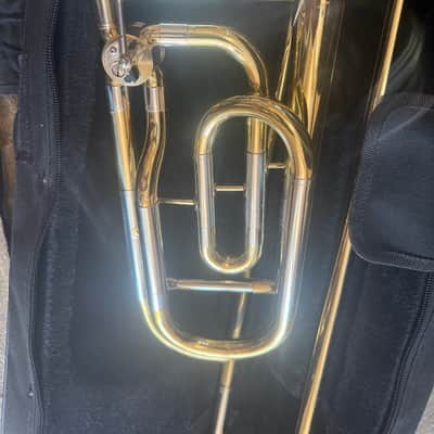 Immagine Gold color trigger trombone, With case and mouthpiece. Large bore - 9