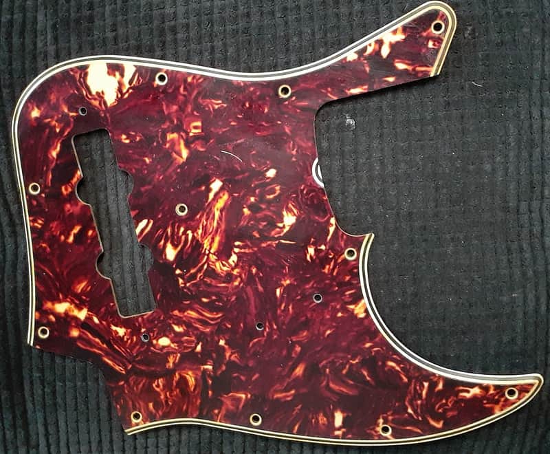 Vintage 1960s Fender Jazz Bass tortoise shell 10 hole pickguard image 1