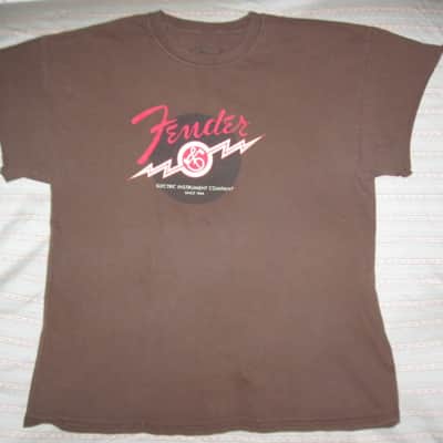 pre-owned genuine Fender Lightning Bolt Logo Short Sleeve, Cotton T-Shirt, XL, Brown (sleeves cut shorter) PN: 9101008621, from 2010, GRAPHIC: Red, Creme, Dark Brown, Fender, Ligntning Bolt, Circles, musical symbols, Electric Instrument Company Since 1946 image 8