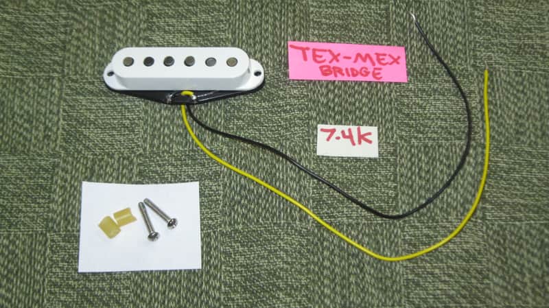 very near A+ (rarely used) genuine Fender Tex-Mex Stratocaster Bridge Single Coil Pickup, 7.4k full strength, White Cover (p/n # 50659000) +screws & rubber bushings, Alnico 5 magnets, staggered pole pieces, Polysol magnet wire, vinyl output wires image 1