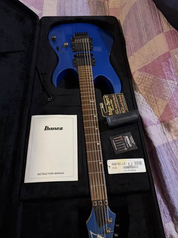 Ibanez RG870Z Premium Laser Blue EMG Attivi - Setup Baritona - Custodia Ibanez image 1