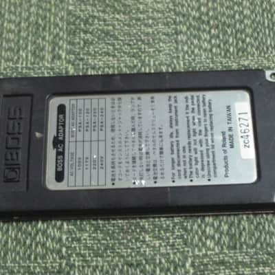 used medium relic'd genuine Boss Bottom Plate (Silver Label Taiwan) for compact (regular) size pedal, from March 1991 - PLATE PART: Metal w/ Silver Finish / BOTTOM LABEL: SLT / EXTERIOR PADDING: Black stiff hardened rubber - NO: pedal/screws/other items image 19